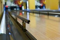 Bowling alley background, lane with bumper rails Royalty Free Stock Photo