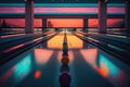 bowling alley, with colorful lanes and balls on display, during sunset