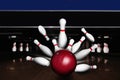 Bowling ball bouncing pins. Successful - strike Royalty Free Stock Photo