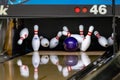 Ball hitting pins at a bowling alley Royalty Free Stock Photo