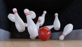 Bowling ball is knocking down pins Strike. 3D rendered illustration.