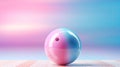 Bowling ball on light blue pink background