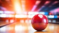 Bowling ball put on alley with blurred bowling pin background. Royalty Free Stock Photo