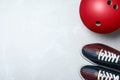 Bowling ball and shoes on light grey marble background, flat lay. Space for text Royalty Free Stock Photo