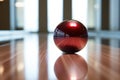 bowling ball sitting on a polished lane