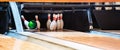 Bowling Ball Striking Pins on Alley Royalty Free Stock Photo