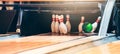 Bowling Ball Striking Pins on Alley Royalty Free Stock Photo