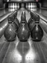 Bowling ball striking pins Royalty Free Stock Photo