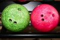 Bowling balls red green closeup row Royalty Free Stock Photo