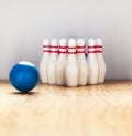 Bowling pins and bowling ball in miniature Royalty Free Stock Photo