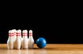 Bowling pins and bowling ball in miniature Royalty Free Stock Photo