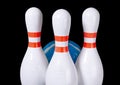 Bowling pins of white color isolated on black background Royalty Free Stock Photo