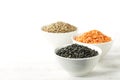 Bowls of assorted dried lentils with red lentils, black beluga l Royalty Free Stock Photo