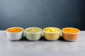 Bowls with baby food on grey background. Generative AI