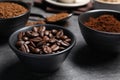 Bowls of beans, instant and ground coffee on grey table, closeup Royalty Free Stock Photo