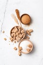 Bowls of brown cane lump and granulated white sugar with crystal sugar stick Royalty Free Stock Photo