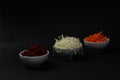 Bowls of cut vegetables - beet, cabbagee, carrot isolated on black background Royalty Free Stock Photo