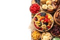 Bowls with different dried fruits on white, top view. Healthy lifestyle Royalty Free Stock Photo