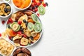 Bowls of different dried fruits on wooden background, top view with space for text Royalty Free Stock Photo