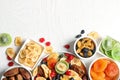 Bowls of different dried fruits on wooden background, space for text. Healthy lifestyle Royalty Free Stock Photo