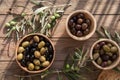 Bowls with different kind of olives green , black, kalamata on table Royalty Free Stock Photo