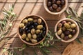 Bowls with different kind of olives green , black, kalamata on table Royalty Free Stock Photo