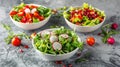 Bowls of fresh mixed salad with a variety of greens and vegetables