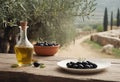 Bowls full of selected black olives and glass decanter of olive oil stand on rustic wooden table. Tree and Italian Royalty Free Stock Photo