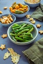 Bowls of healthy colorful vegetable and parmesan cheese chips