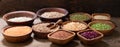 Bowls of legumes, lentils, chickpeas, beans, rice and cereals