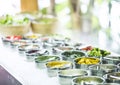 Bowls of mixed fresh organic vegetables in salad bar display Royalty Free Stock Photo