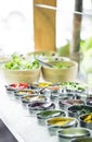 Bowls of mixed fresh organic vegetables in salad bar display Royalty Free Stock Photo