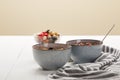 Bowls with muesli, dried berries and