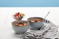 Bowls with muesli, dried berries and