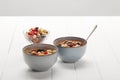 Bowls with muesli, dried berries and