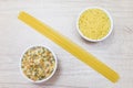 Bowls of noodles, pasta stars and spaghetti Royalty Free Stock Photo