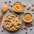 Bowls with peanut butter and peanuts