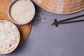 Bowls with raw and cooked white long grain rice Royalty Free Stock Photo