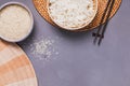 Bowls with raw and cooked white long grain rice Royalty Free Stock Photo