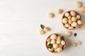 Bowls with shelled organic Macadamia nuts