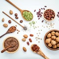 Bowls and spoons of various legumes and different kinds of nuts Royalty Free Stock Photo
