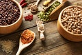 Bowls and spoons of various legumes Royalty Free Stock Photo