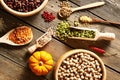 Bowls and spoons of various legumes Royalty Free Stock Photo