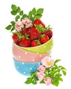 Bowls with strawberries and flowers decoration