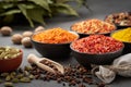 Bowls of various aromatic spices and herbs. Different seasoning. Condiments for healthy cooking Royalty Free Stock Photo