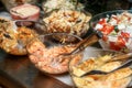 Bowls with various food in self service restaurant Royalty Free Stock Photo