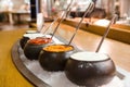 Bowls with various sauces at the self-service restaurant. Royalty Free Stock Photo