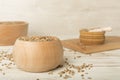 Bowls with wholegrain spelt farro on wooden table