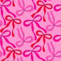 Seamless pattern with pink and red bows. Vector graphics. Royalty Free Stock Photo