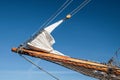 Bowsprit and gathered sail of a large sailing ship Royalty Free Stock Photo